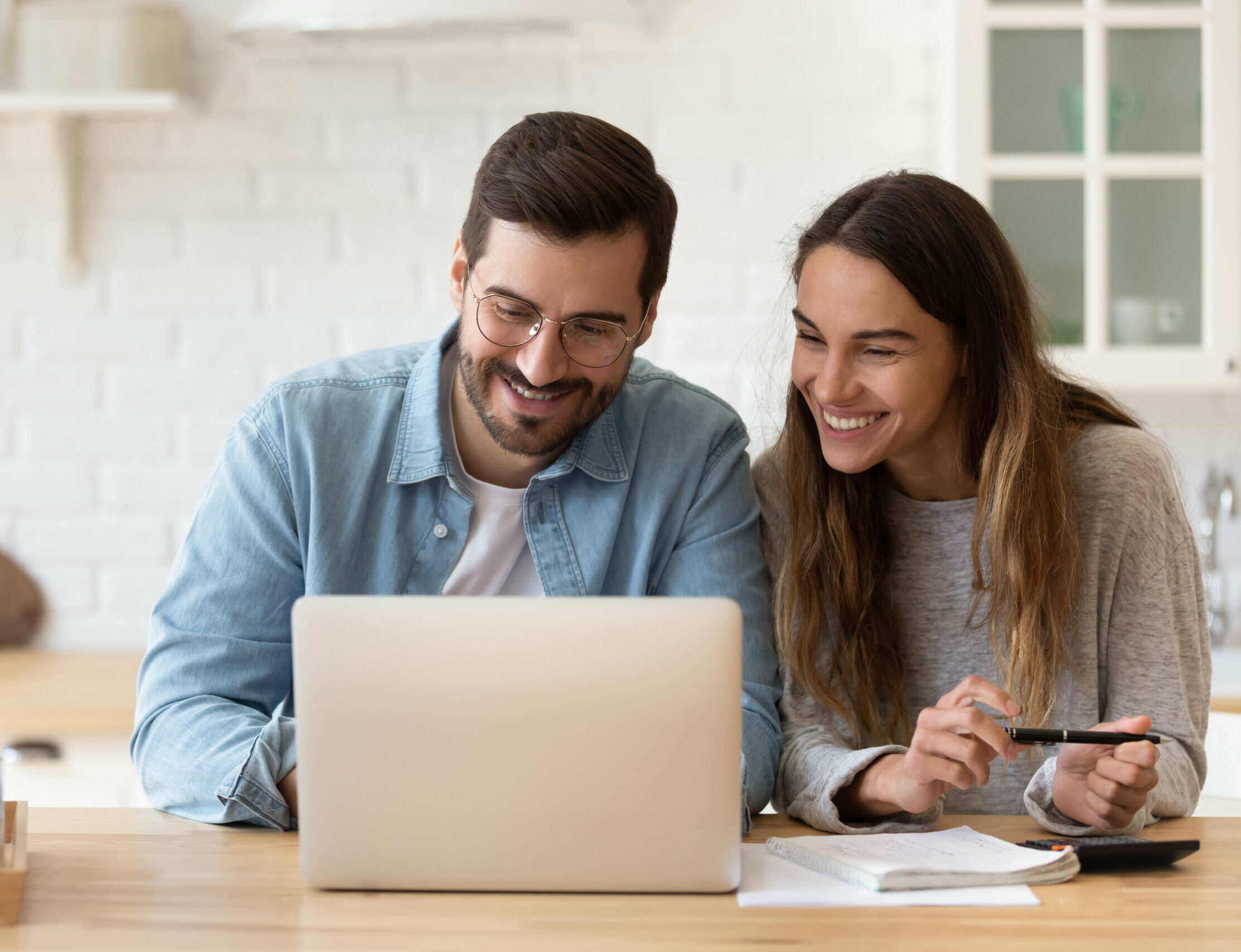 Happy,Young,Couple,Planning,Budget,,Reading,Good,News,In,Email,